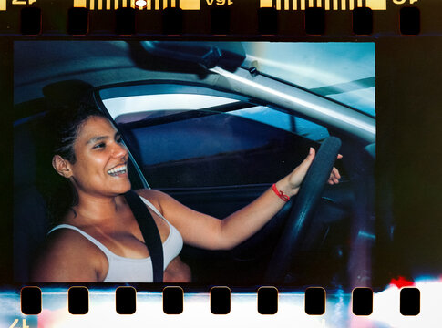 Laughing driver behind the wheel