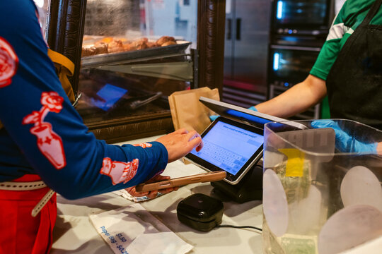 Touchscreen Checkout Customer Pays Register