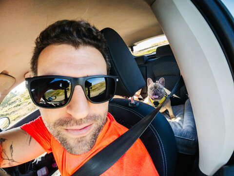Car selfie with french bulldog