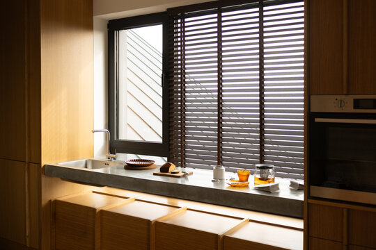 Contemporary Kitchen Breakfast Counter with Fresh Tea and Sliced Bread
