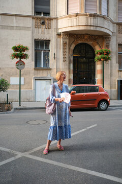 Female Tourist Crossing Budapest Street