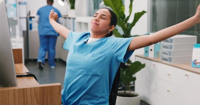 Tired, stretch and woman in hospital with computer, admin fatigue and low energy in medical center. Overworked, tech and nurse with yawning, clinical burnout and exhausted with healthcare research.
