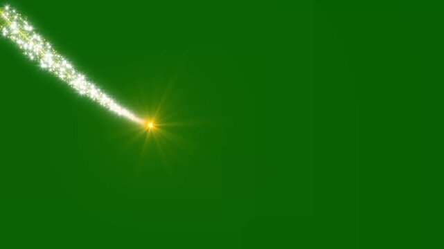 Golden glowing star dust ring burst vfx sparkling celestial particle. twinkling stars and magical swirl path on green background. Sparkling golden comet trail with glowing light tail 4k.