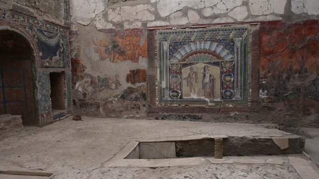 ERCOLANO, ITALY - SEPTEMBER 2026: Ancient Roman wall mosaic depicting Neptune and Amphitrite inside the nymphaeum of the House of Neptune and Amphitrite in Herculaneum.