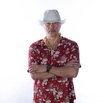 Portrait of an old cowboy in a Hawaiian shirt