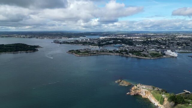 Plymouth, Devon, England: DRONE VIEWS: Plymouth Sound; Drake's Island; River Tamar; Devonport dockyard; City of Plymouth; Passenger ferry moored near Millbay pier. Plymouth is a busy UK port.
