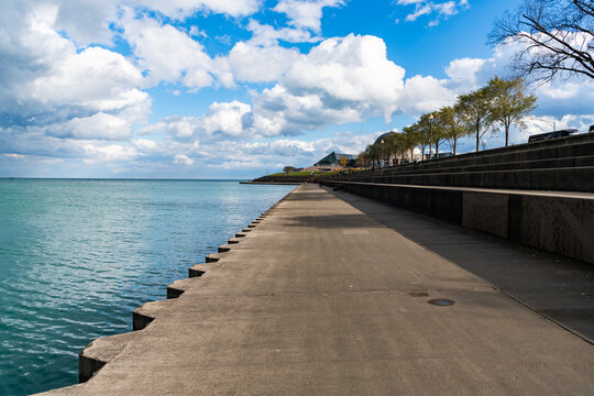 Chicago lakefront walking path. Downtown architecture and lake. Chicago city downtown. Skyscraper architecture. Chicago city cityscape. Cityscape with skyscraper building. Lakefront promenade