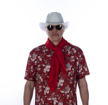 Portrait of an old cowboy in a Hawaiian shirt
