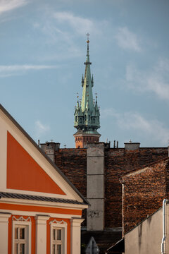 Krakow, Poland - July 18, 2026: Spire of St. Joseph&rsquo;s Church rises above buildings in the historic Podgorze district.