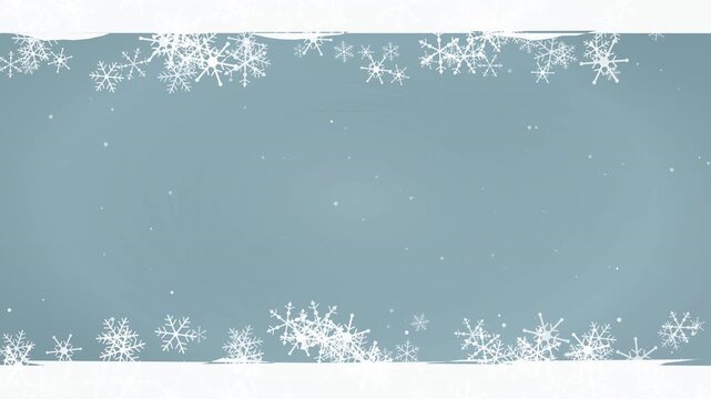 Winter snowflakes border gently floating and swirling around copy space for seasonal holiday Christmas