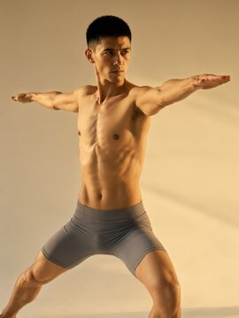 Muscular Man in Warrior Pose