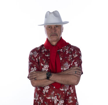 Portrait of an old cowboy in a Hawaiian shirt