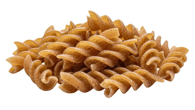 Pile of whole wheat fusilli pasta spirals, isolated on transparent background