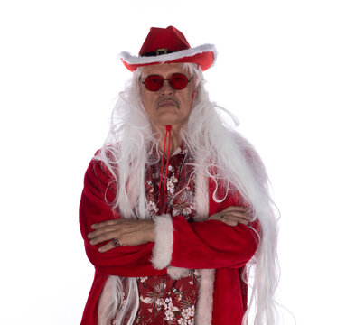 Portrait of a man in a Christmas cowboy hat, isolated on a white background.