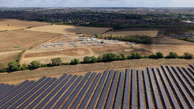 Aerial view of grid scale battery energy storage system and solar farm in the UK countryside