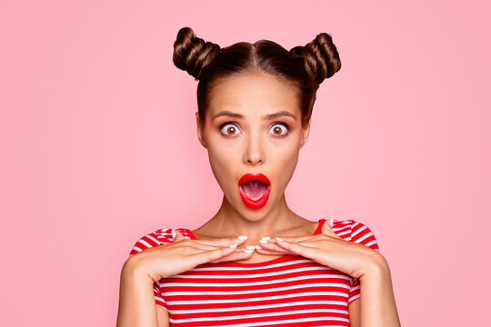 Total sale! Close up portrait of excited and surprised young brunette girl who opened wide her mouth and eyes isolated on red background