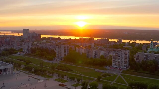 Perm, Russia. Panorama of the city of Perm from the air during sunset. Kama river. Drone footage