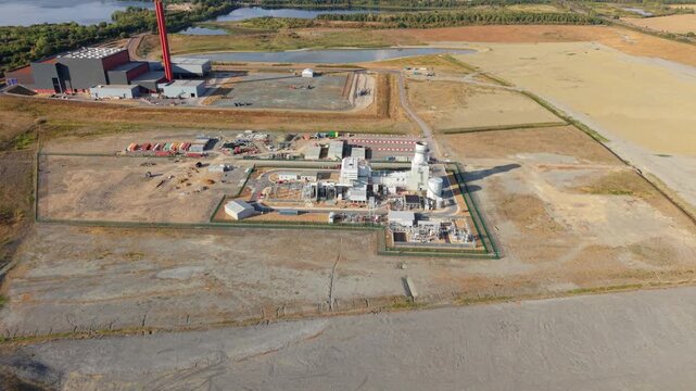 Aerial view of co-located gas turbine power plant and energy recovery facility in Bedfordshire, UK