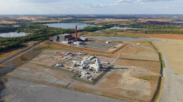 Aerial view of co-located gas turbine power plant and energy recovery facility in Bedfordshire, UK