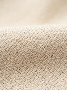 A detailed close-up shot focusing on the weave pattern, texture, and natural fibers of a pale beige cotton fabric, providing a tactile feel, background, cotton, copy space