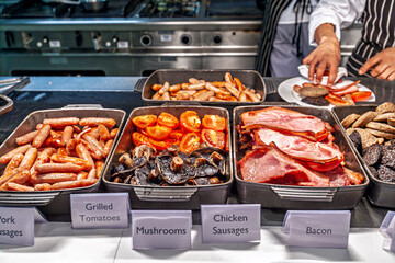 Obraz premium Dublin Hotel Breakfast Buffet Offering Full Irish Spread Cooked Food