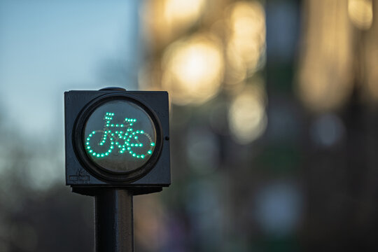 Green Bicycle Traffic Light on Bike Lane with Bokeh, Seville