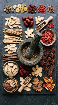 Daoism medicinal philosophy: Taoism alchemy, herbal remedy, holistic balance, stone mortar, dry root, natural healing, botanic preparation, ancient wisdom, organic spice.