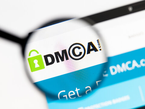 Milan, Italy 2026, 15 AGO Closeup of dmca website page on a laptop screen. Focus on dmca logo under a magnifying glass.