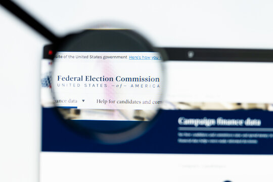 Milan, Italy 2026, 15 AGO Closeup of Federal Election Commission FEC website page on a laptop screen. Focus on Federal Election Commission FEC logo under a magnifying glass.