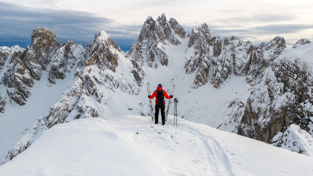 Winter Mountain Scenery with Man on Cross-Country Skis