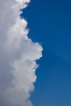 blue sky  white clouds and sunrays