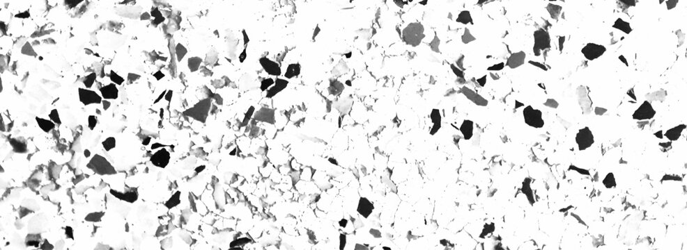 Black and White Terrazzo Stone Texture with Scattered Gray Fragments, Irregular Chips, Rough Aggregate Surface and Contemporary Pattern. Monochrome Terrazzo Background with Black Gray Stone Chips.