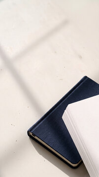 Minimalist Notebooks and Journal Mockup on White Desk