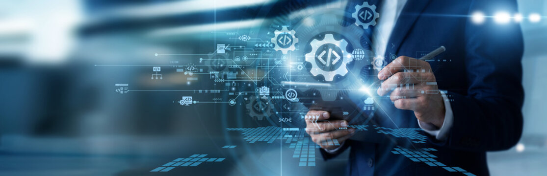 Frontend programmer working on tablet reviewing Software Development project roadmaps, debugging reactive code components, writing interface documentation, and coordinating sprint cycles.