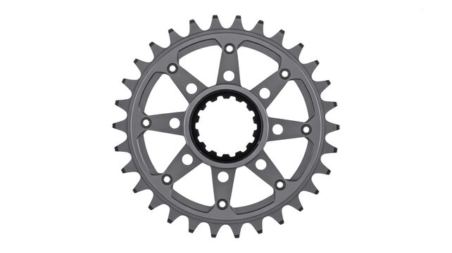 A metallic gray bicycle chainring with gear teeth isolated on a white background, for bike repair
