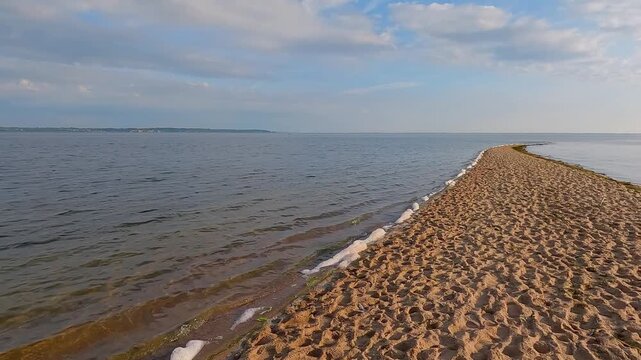 Marvelous summer seascape of Baltic sea with the end of the sandbar. Picturesque morning scene of Rewa public beach, Poland, Europe. 4K video (Ultra High Definition).