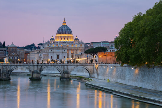 St peter's basilica at Dusk with river and bridge