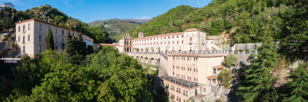 Santuario di san francesco di Paola church on lush hillside in Paola
