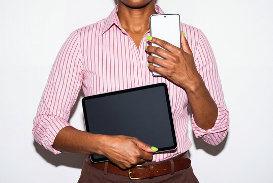 Professional With Tablet and White Smartphone