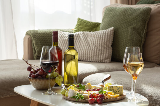 Elegant Wine and Cheese Tasting Experience Served on a Coffee Table at Home