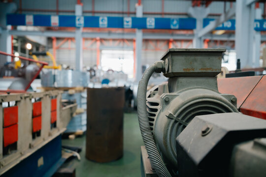 Industry metal sheet factory engineer professional focus diligent worker busy manufacturing warehouse production maintenance heavy machinery