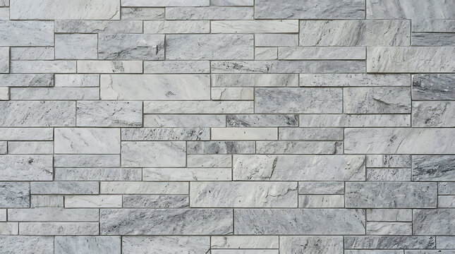 Modern light gray stone veneer wall cladding with textured rectangular blocks for architectural design