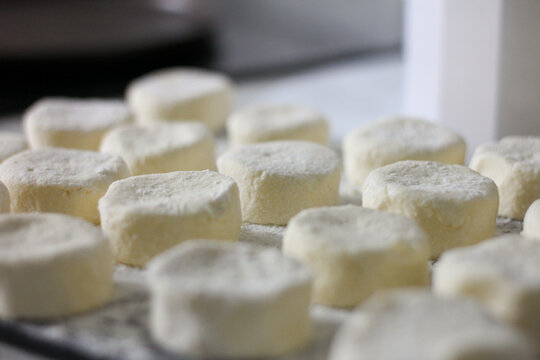 Uncooked homemade syrnyky ready for frying