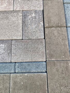 Multi colored concrete interlocking pavers texture full frame
