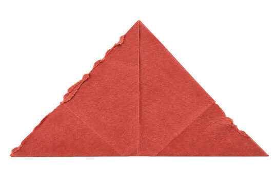 A single triangular piece of folded red paper with rough torn edges isolated on white background