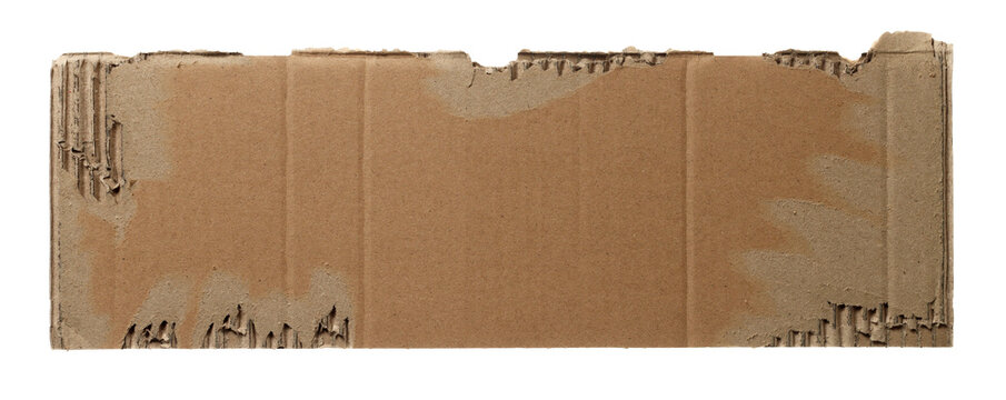 Torn ripped cardboard scrap isolated on white background