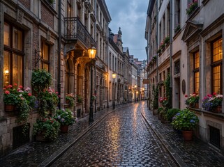 Fototapeta premium Charming European old town cobblestone street glowing with warm evening lights and flowers