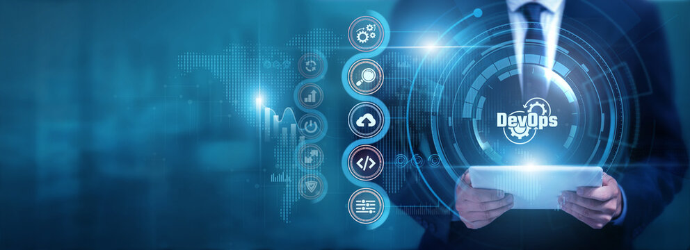 Businessman using tablet analyzing DevOps and software data, monitoring development workflows, improving deployment efficiency, optimizing digital operations and system performance