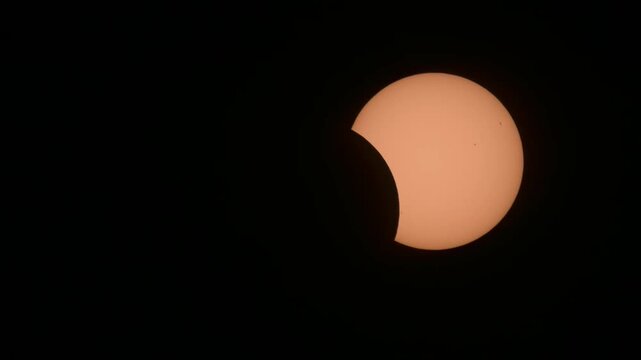 Close-up telephoto view of a partial solar eclipse