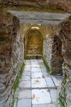 Vaulted corridor with stone lintel in the early Christian Catacomb of Saint John the Baptist, Thessaloniki, Greece